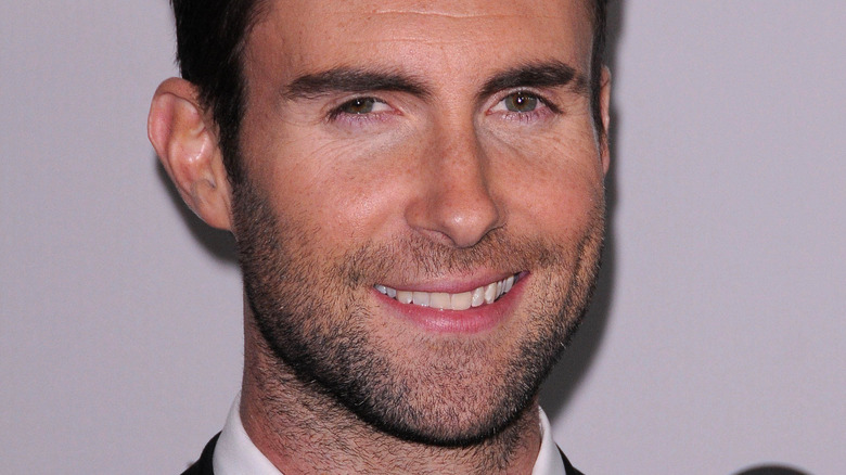 Adam Levine smiling