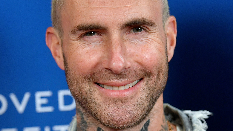 Adam Levine smiling