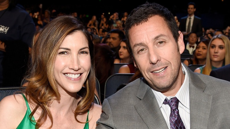 Jackie and Adam Sandler smiling