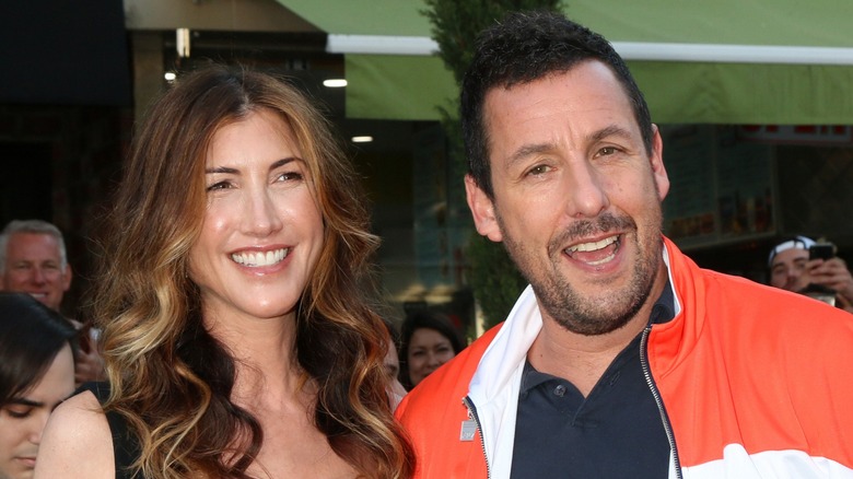 Jackie and Adam Sandler smiling