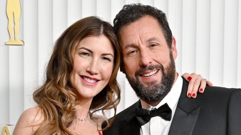 Jackie and Adam Sandler smiling