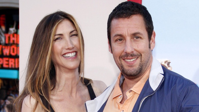Jackie and Adam Sandler smiling