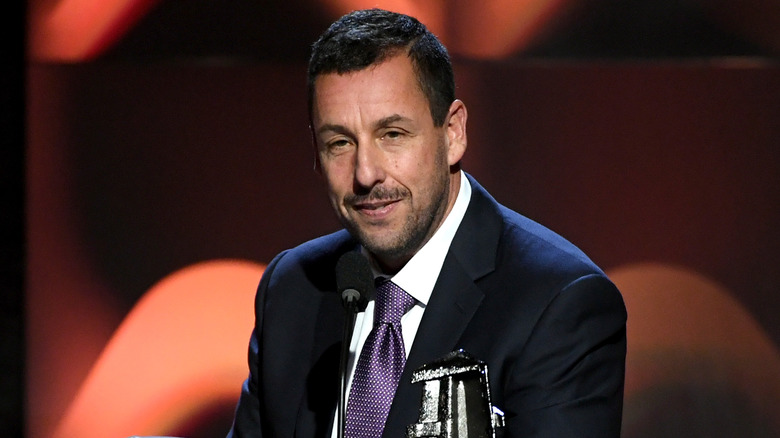 Adam Sandler accepting a film award