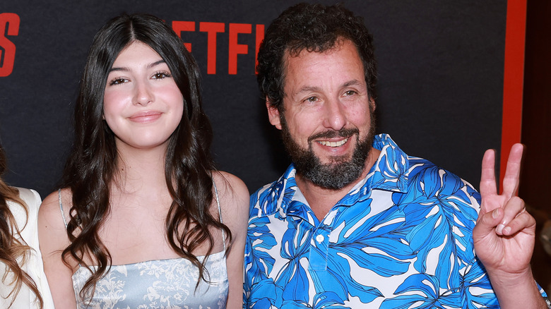 Sunny Sandler smiling, Adam Sandler making peace sign