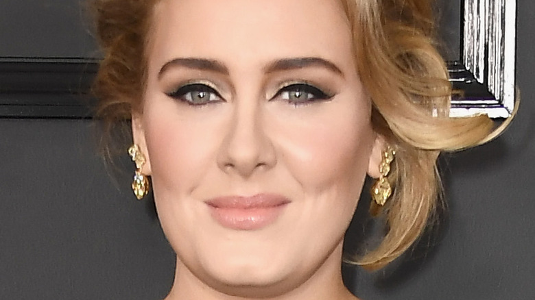 Adele posing on red carpet