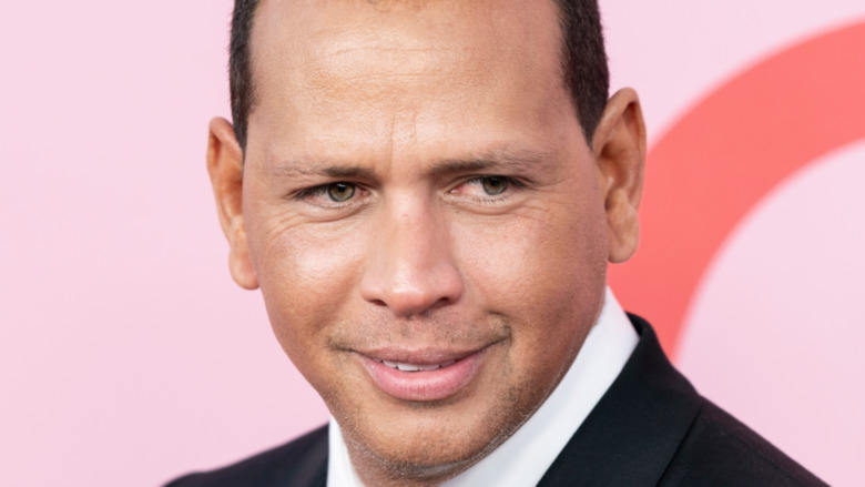 Alex Rodriguez smirks on the red carpet