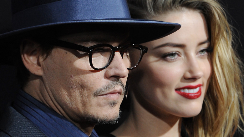 Johnny Depp and Amber Heard posing