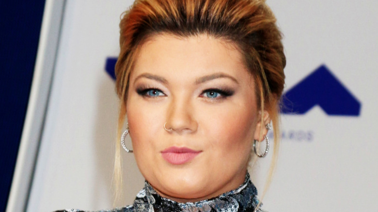 Amber Portwood posing at a red carpet event