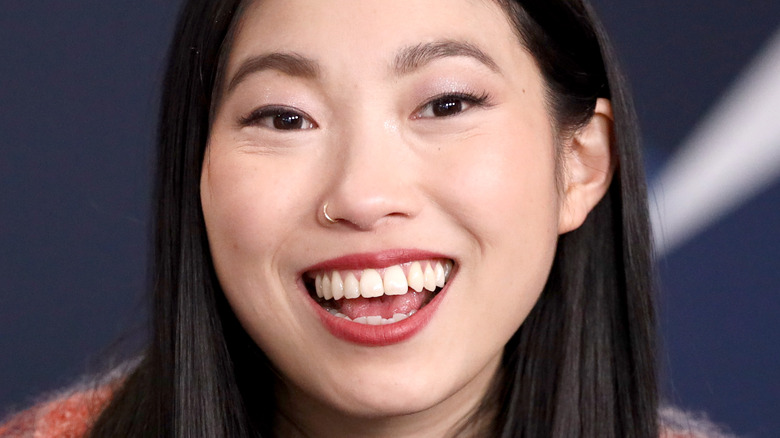 Awkwafina big smile open mouth looking at camera