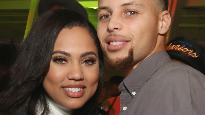 Ayesha, Steph Curry at event