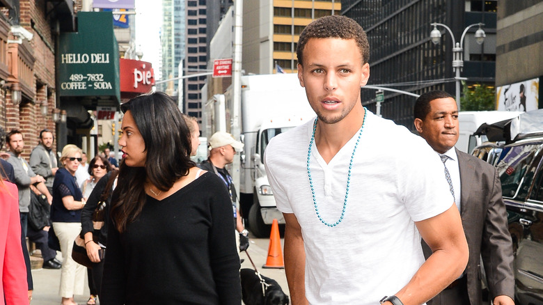 Steph and Ayesha Curry walking