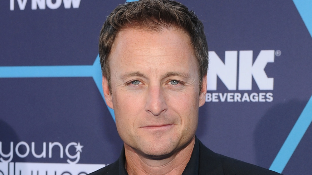 Chris Harrison smirking