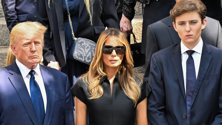 Donald, Melania, and Barron Trump looking sober