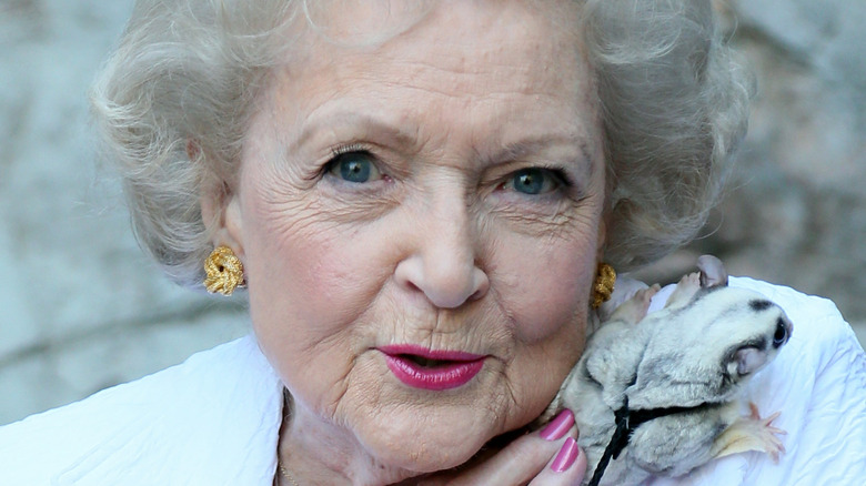 Betty White with an animal