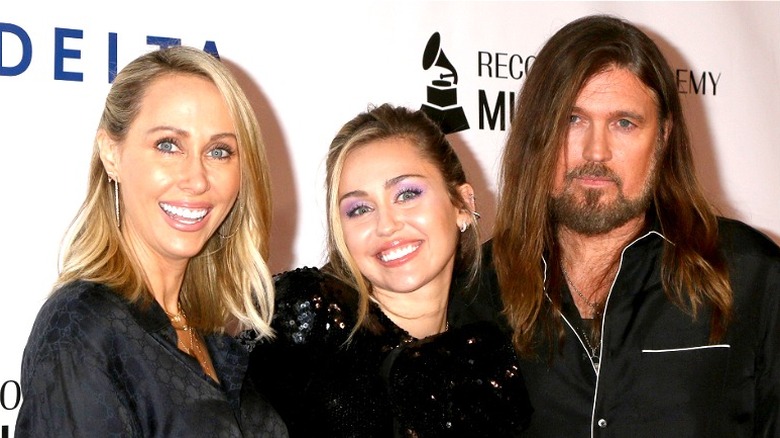 Tish Cyrus, Miley Cyrus, Billy Ray Cyrus, smiling in 2019 photo