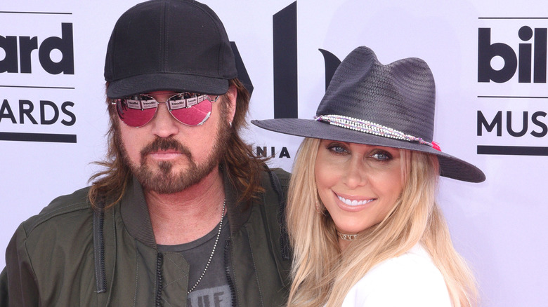Billy Ray Cyrus, Tish Cyrus, posing in 2017 photo