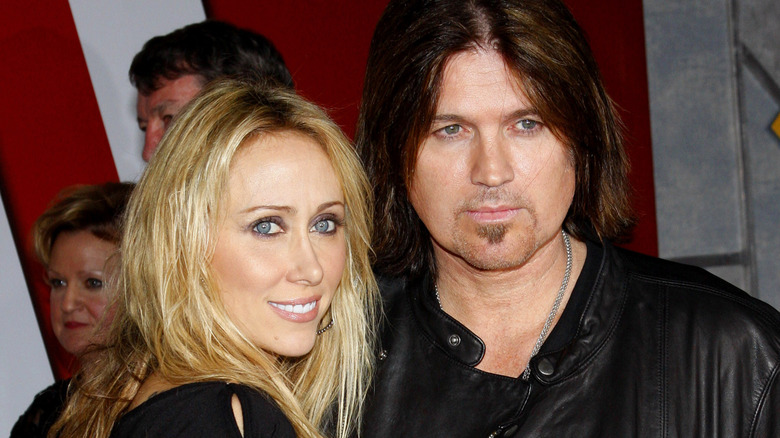 Tish Cyrus, Billy Ray Cyrus, posing in 2008 photo