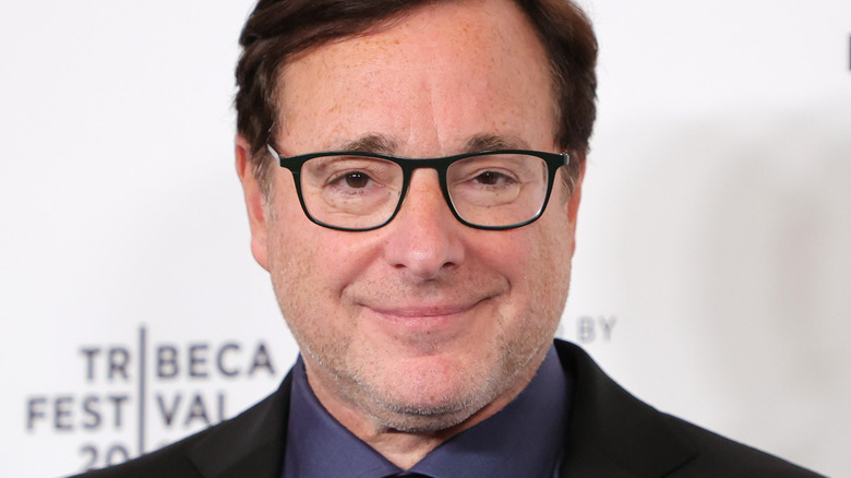 Bob Saget smiles softly