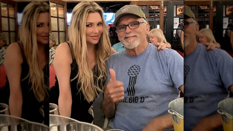 Brandi Glanville and Guy Glanville posing for photo