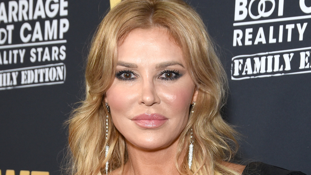 Brandi Glanville posing on the red carpet