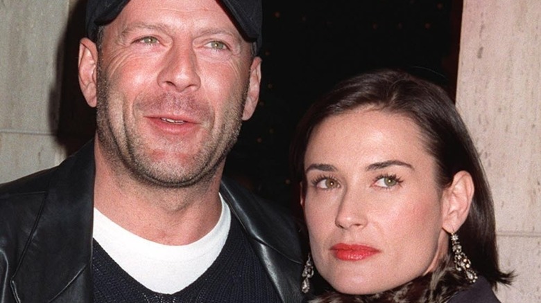 Bruce Willis and Demi Moore posing together