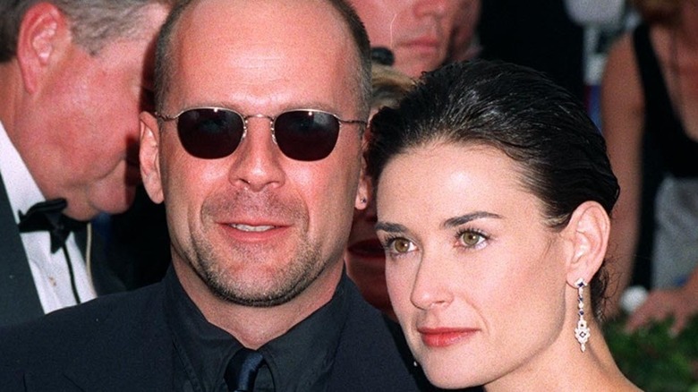 Bruce Willis and Demi Moore posing together