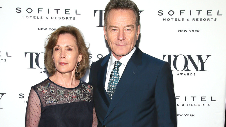 Robin Dearden and Bryan Cranston serious faces