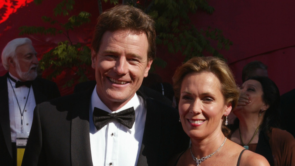 Brian Cranston and Robin Dearden happy, people laughing in background