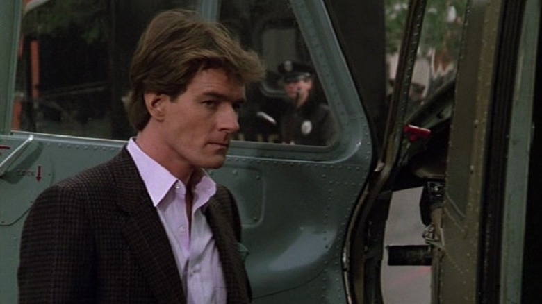 Bryan Cranston in Airwolf, outside a helicopter