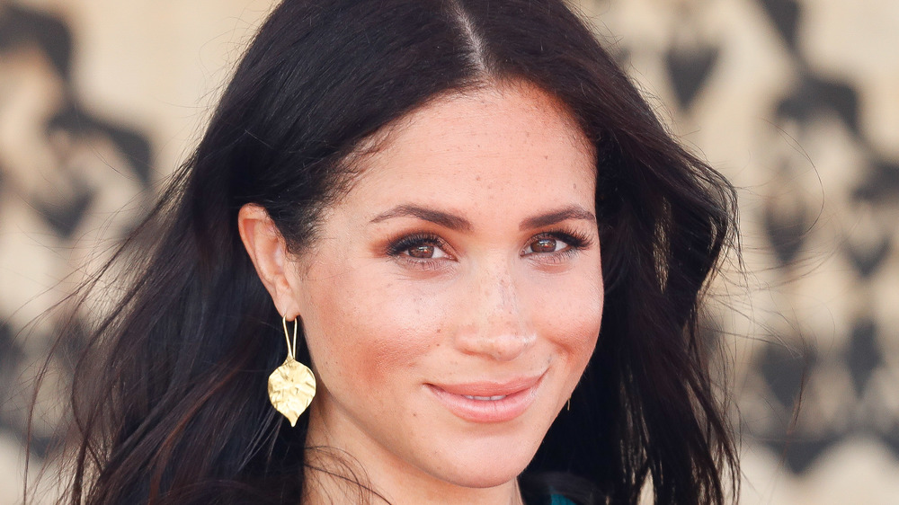 Meghan Markle grinning