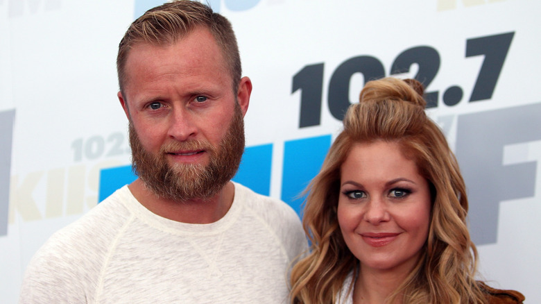 Valeri Bure and Candace Cameron Bure posing