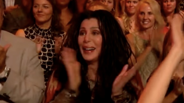 Cher cheering on Chaz Bono in the audience at Dancing With the Stars