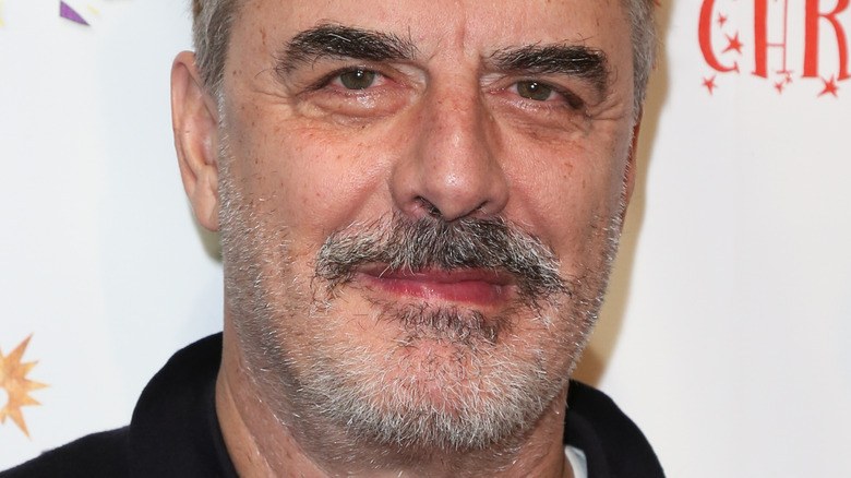 Chris Noth posing at an event