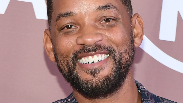 Will Smith smiles