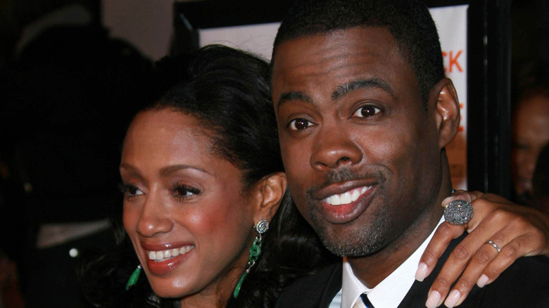 Malaak Compton and Chris Rock at the premiere of "I Think I Love My Wife".
