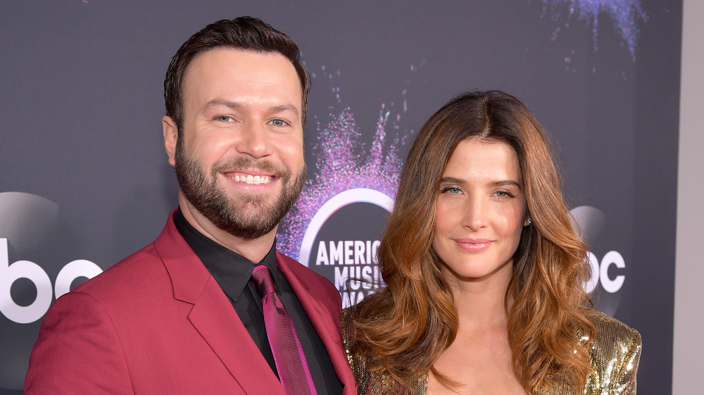 Taran Killam and Cobie Smulders posing