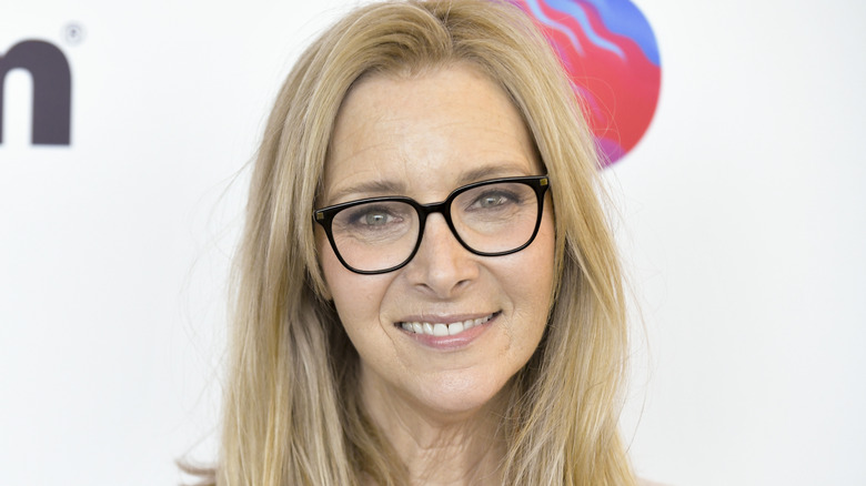 Lisa Kudrow smiling with glasses