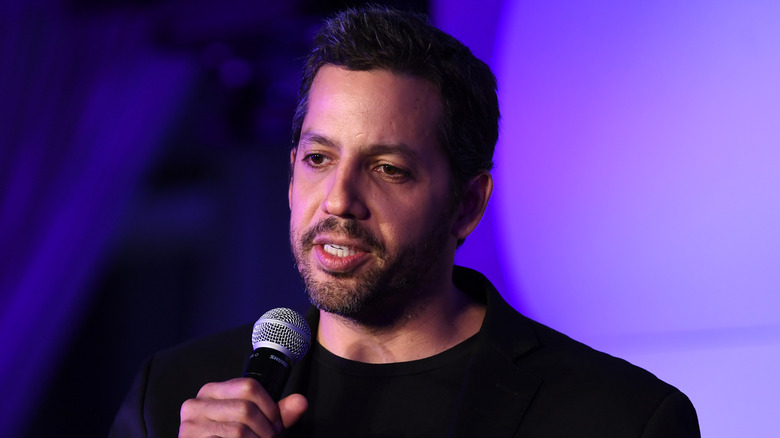 David Blaine speaking into microphone