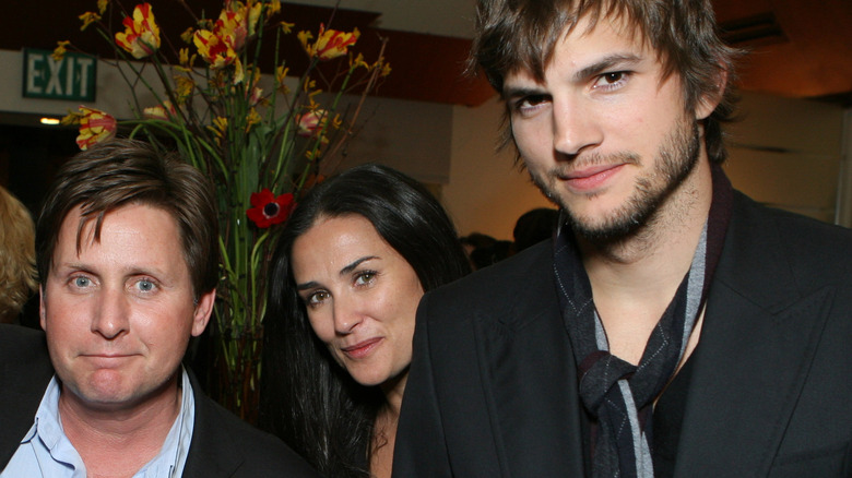 Demi Moore between Emilio Estevez, Ashton Kutcher