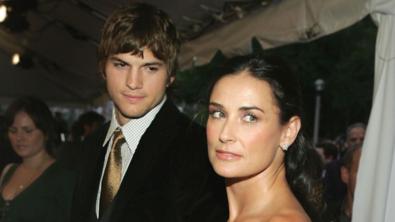 Ashton Kutcher looking at Demi Moore