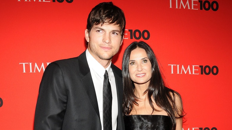 Demi Moore, Ashton Kutcher posing