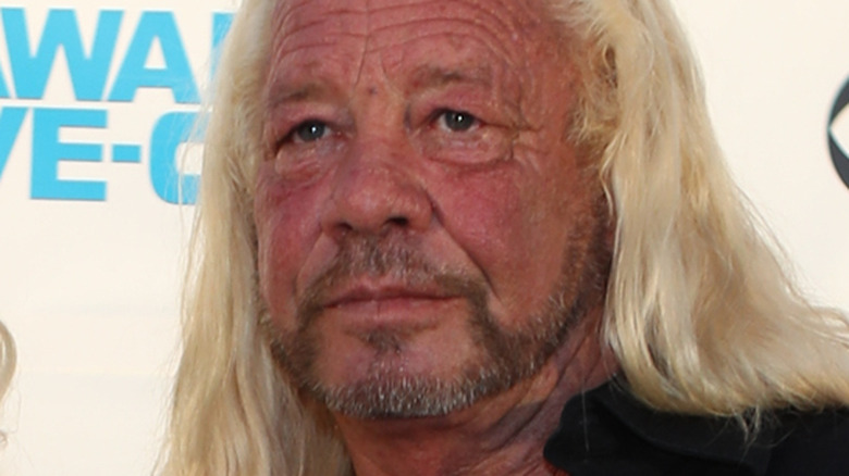 Dog the Bounty Hunter poses for a photo