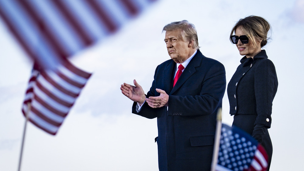 Donald and Melania Trump speak to supporters before boarding Air Force One