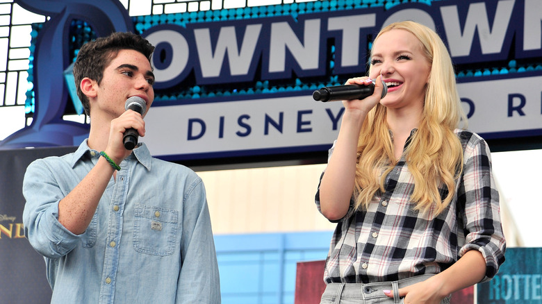 Cameron Boyce singing with Dove Cameron at Disneyland