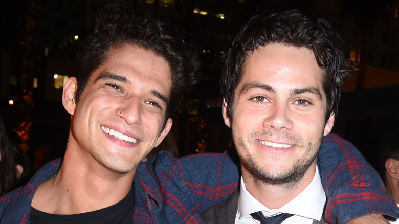 Tyler Posey and Dylan O'Brien smiling