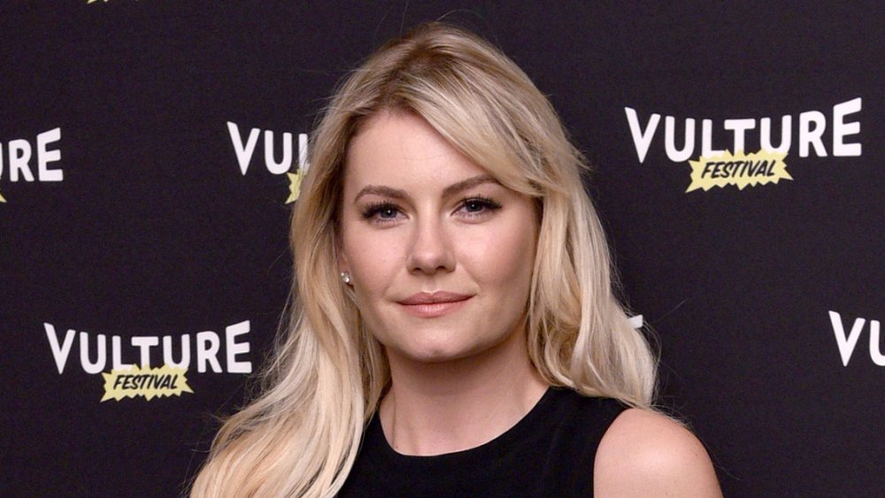 Elisha Cuthbert in front of Vulture Festival wall