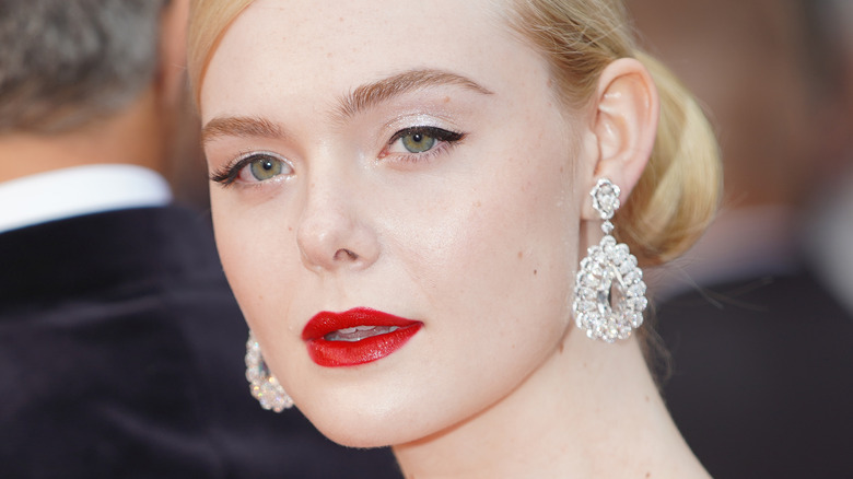 Elle Fanning with teardrop earrings