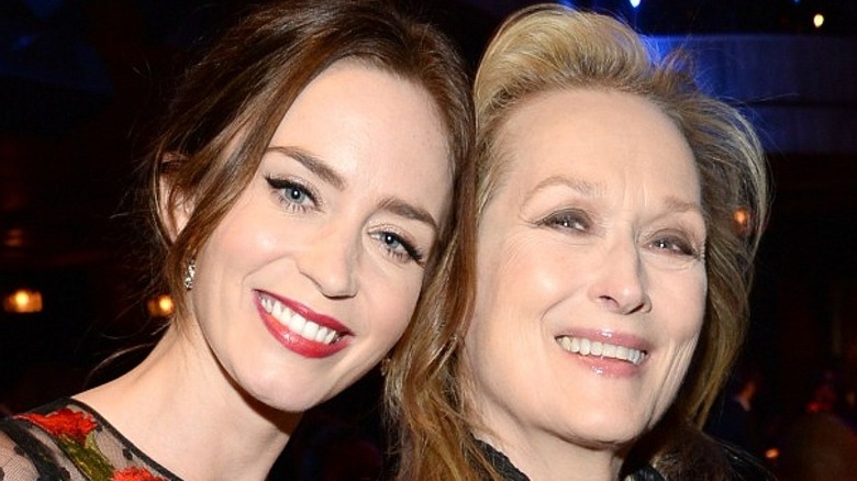 Emily Blunt and Meryl Streep smiling together 