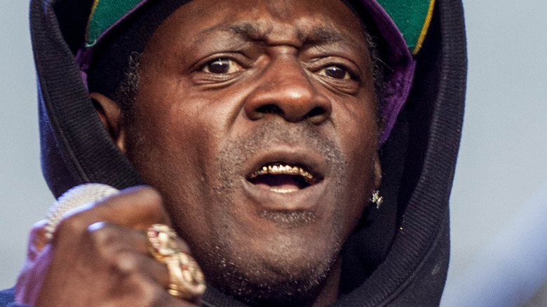 Flavor Flav with an upset expression