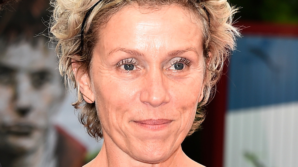 Frances McDormand smiling on the red carpet 